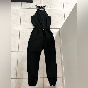 Black Jumpsuit with Pearl Neckline and adjustable waist tie - Junior S by XOXO